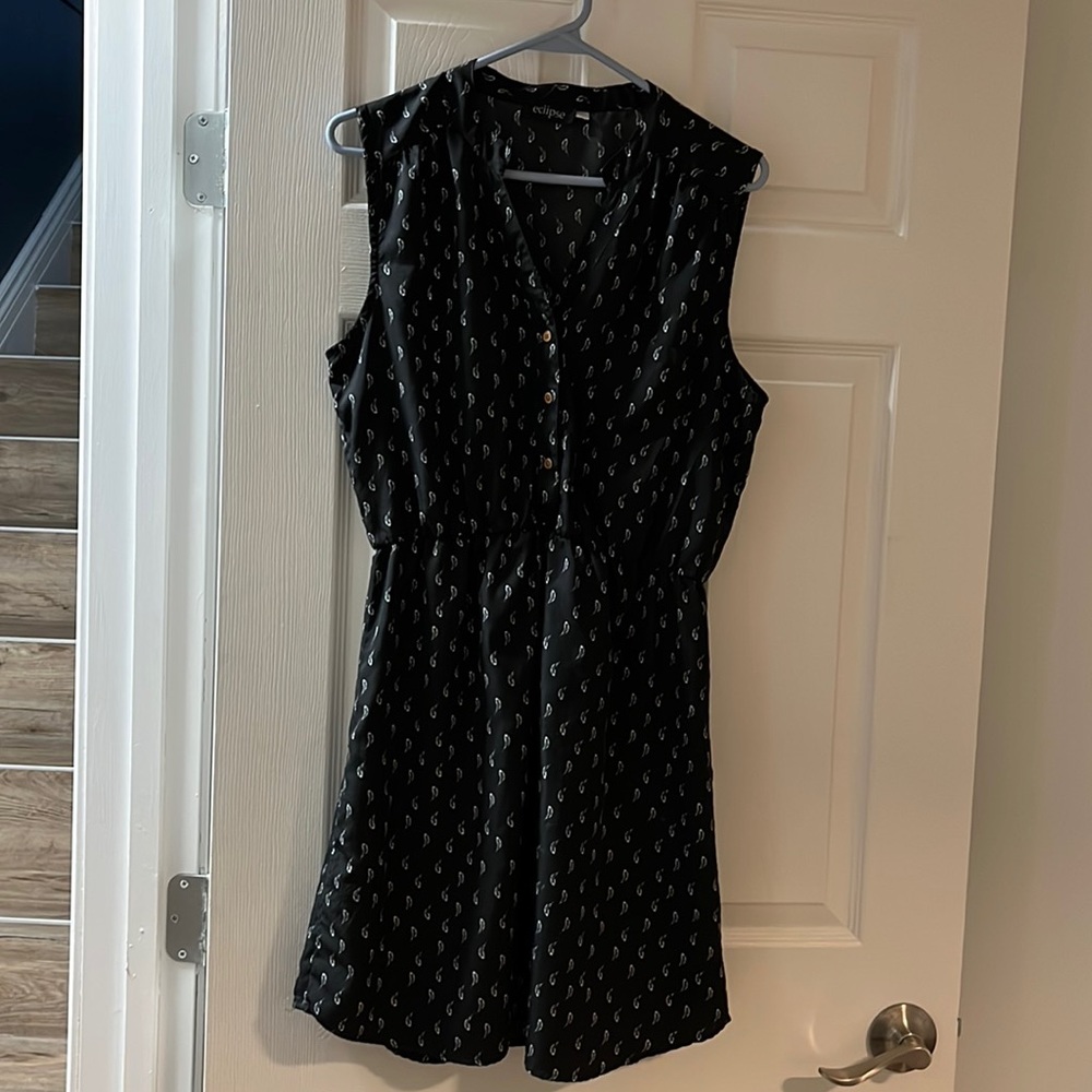 ***Eclipse black & white feather light dress.
